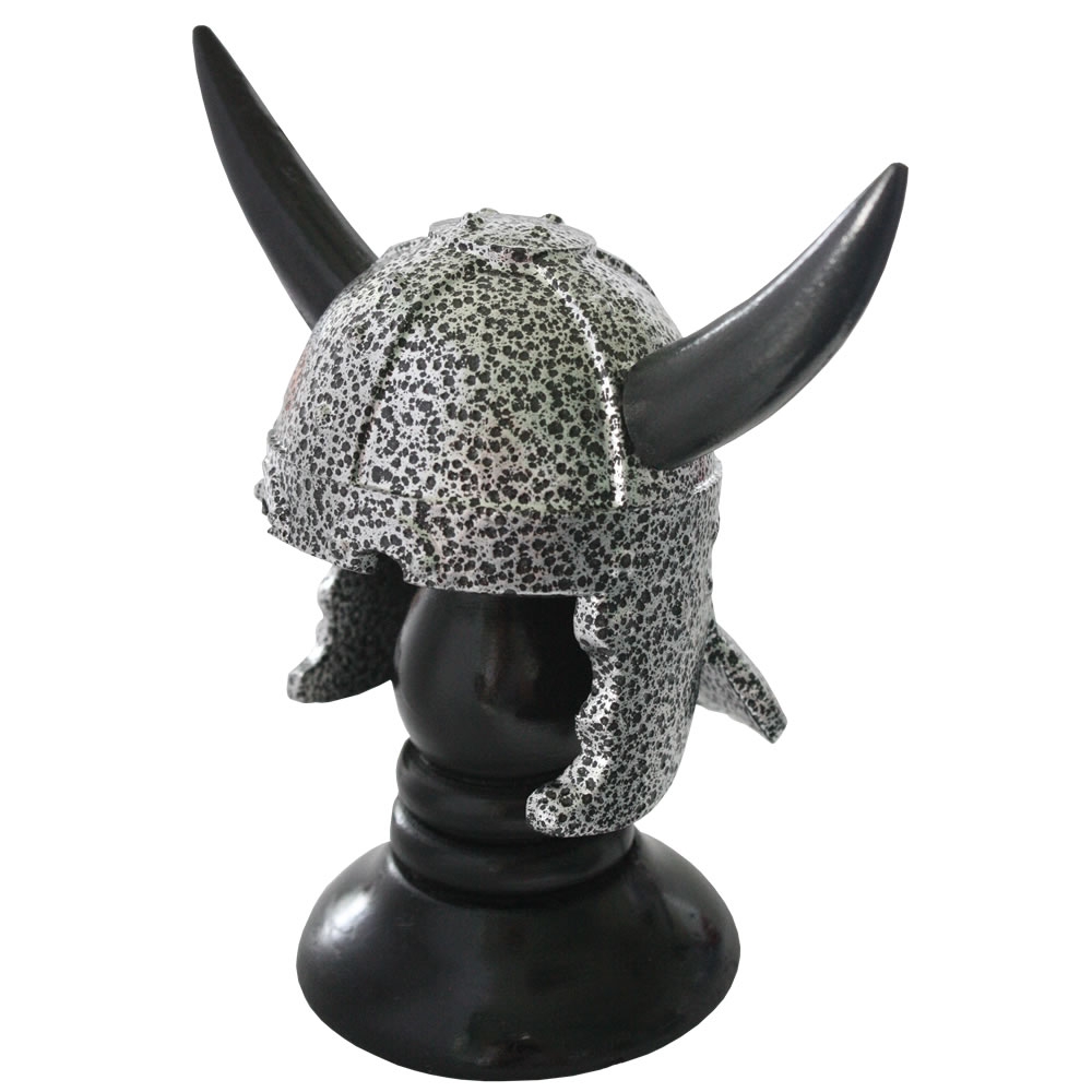 Miniature viking helmet on stand